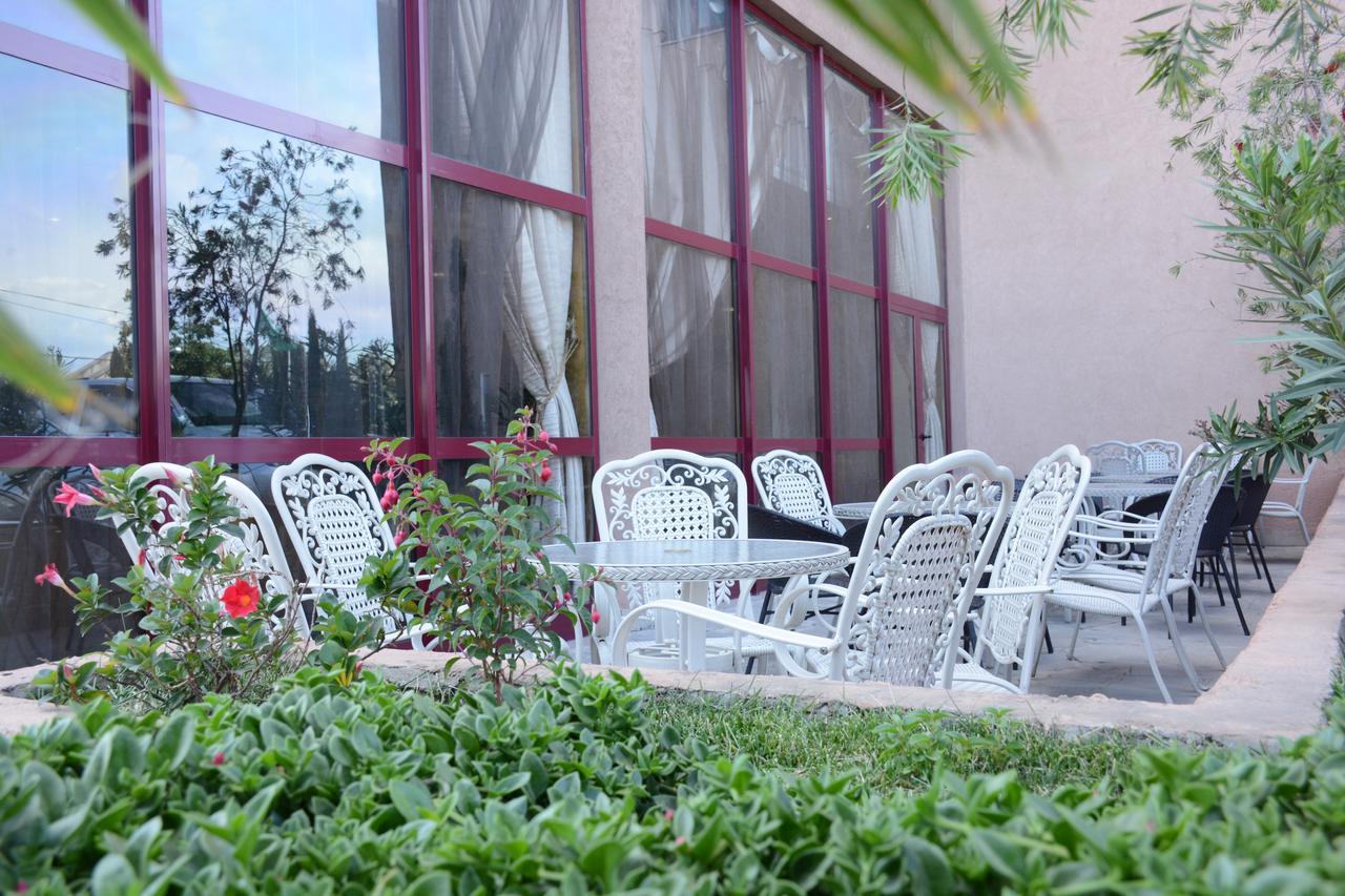 Kenenisa Hotel Addis Ababa Exterior photo